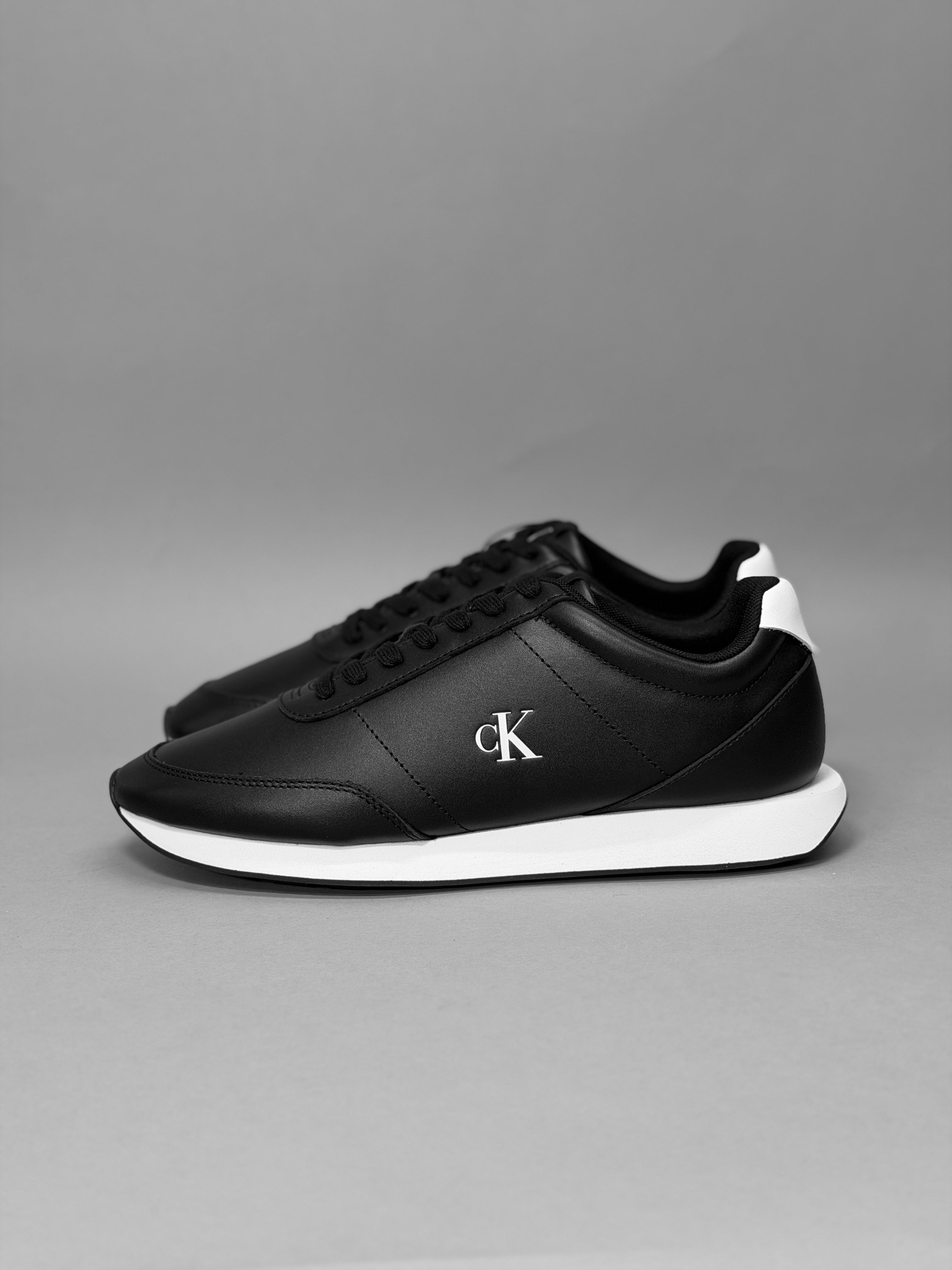 CALZADO HOMBRE CALVIN KLEIN RETRO RUNNER ESS LTH YM0YM01355-0GM