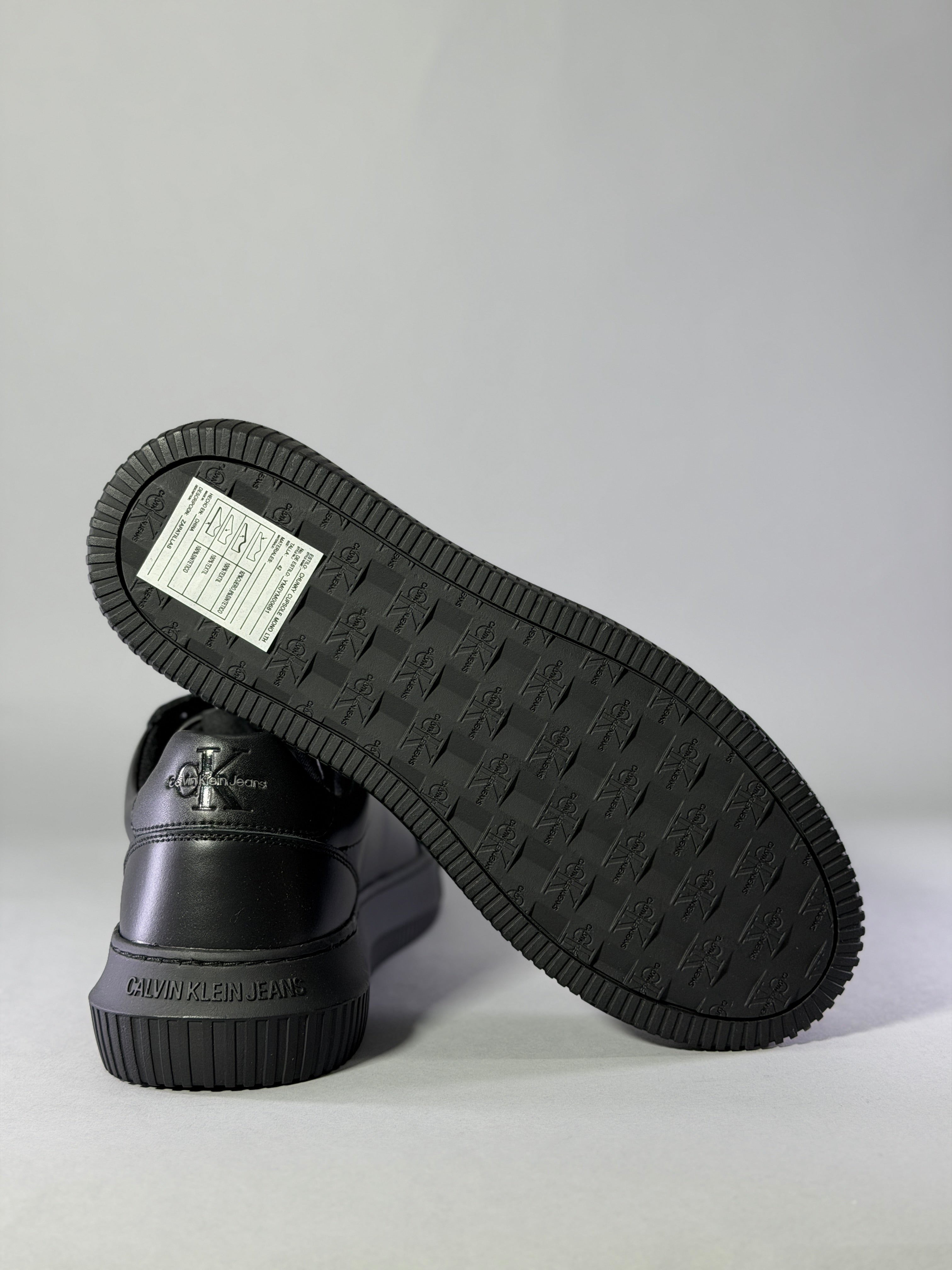 CALZADO HOMBRE CALVIN KLEIN CHUNKY CUPSOLE MONOLOGO LTH ML YM0YM00681-0GT